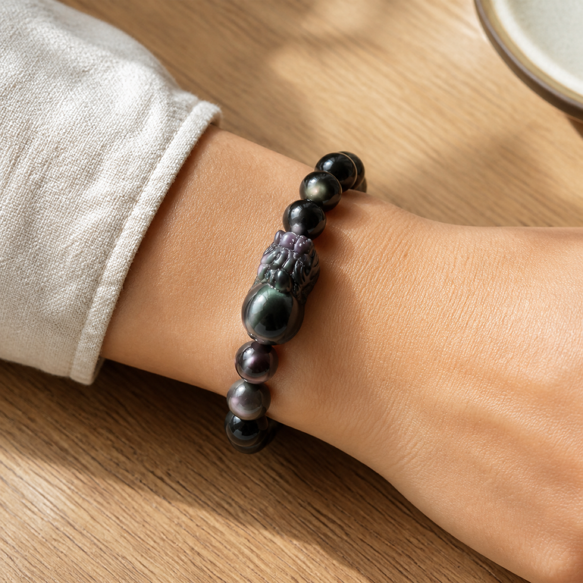 QI KIND Iridescent Dark Bead Bracelet lifestyle image